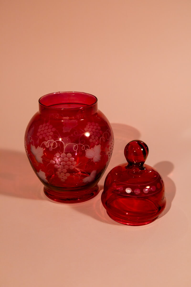 Vintage decorative bottle with vine pattern