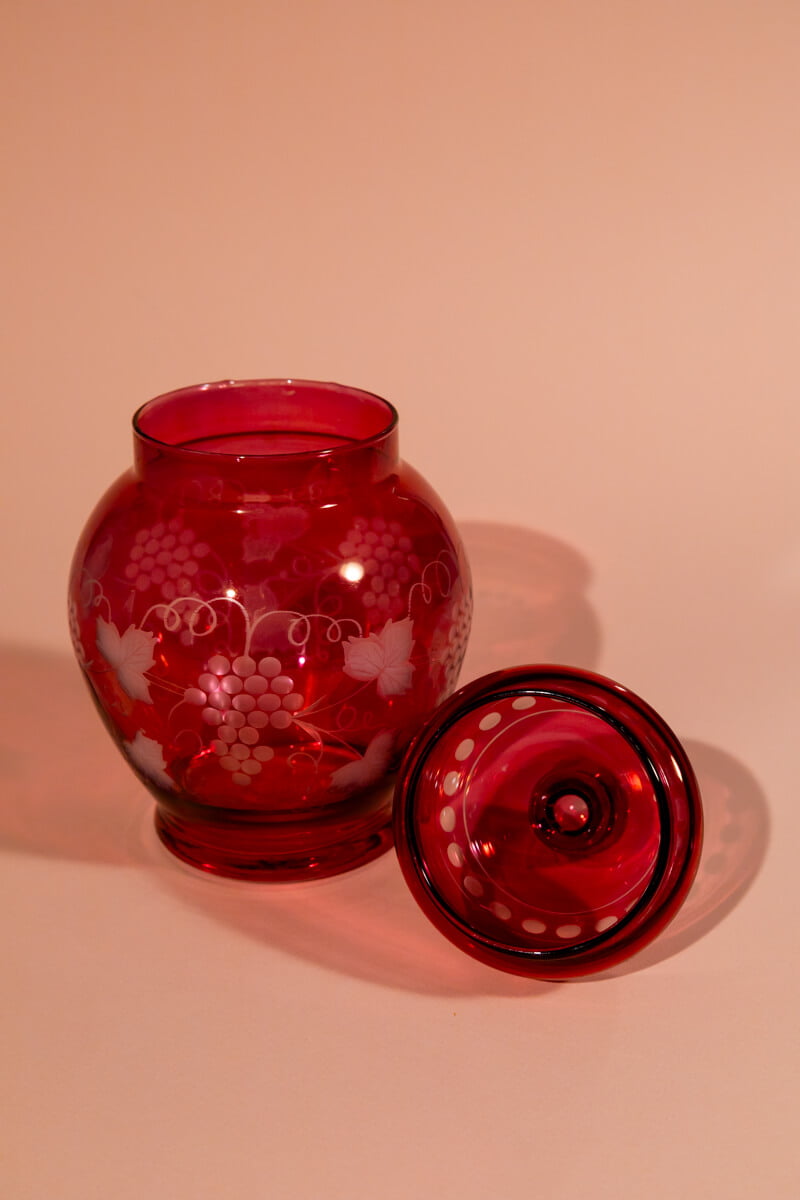 Vintage decorative bottle with vine pattern