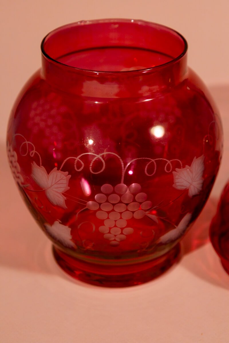 Vintage decorative bottle with vine pattern